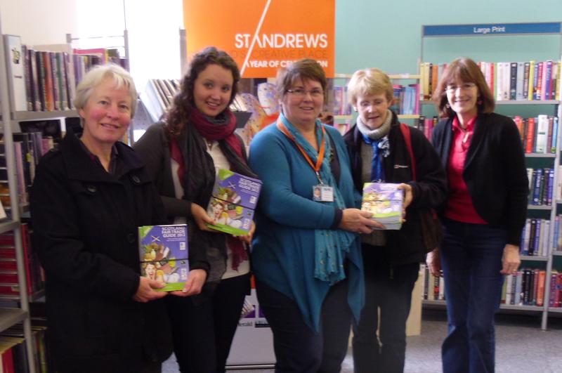 Handing over Fairtrade Scotland leaflets at the library
