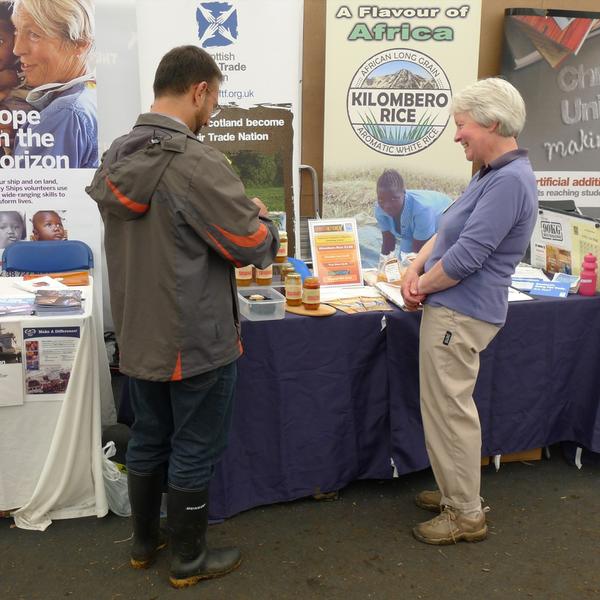 Marie helping at the Just Trading stall